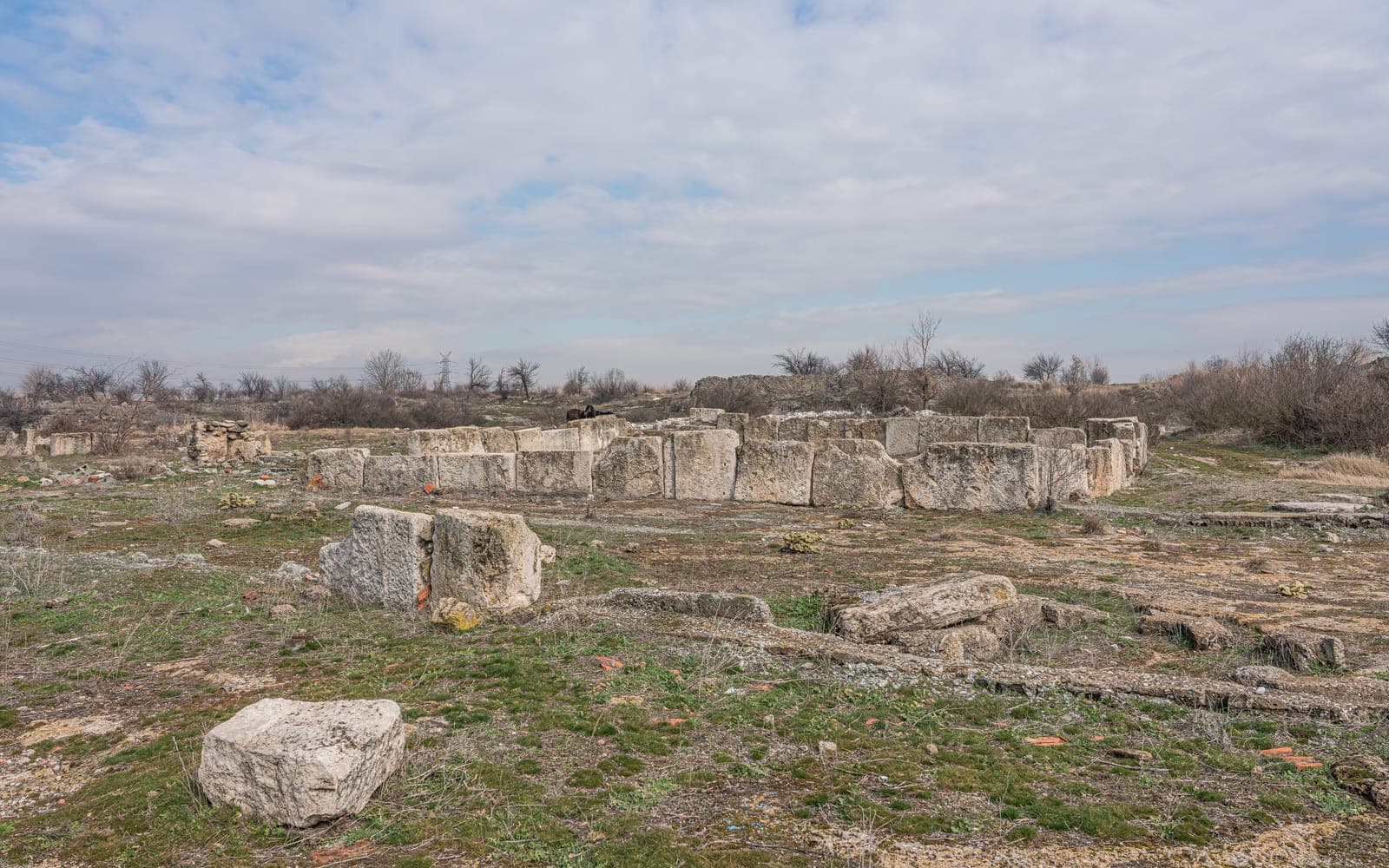 The unexcavated mound of ancient Colossae with Honaz Mountain behind