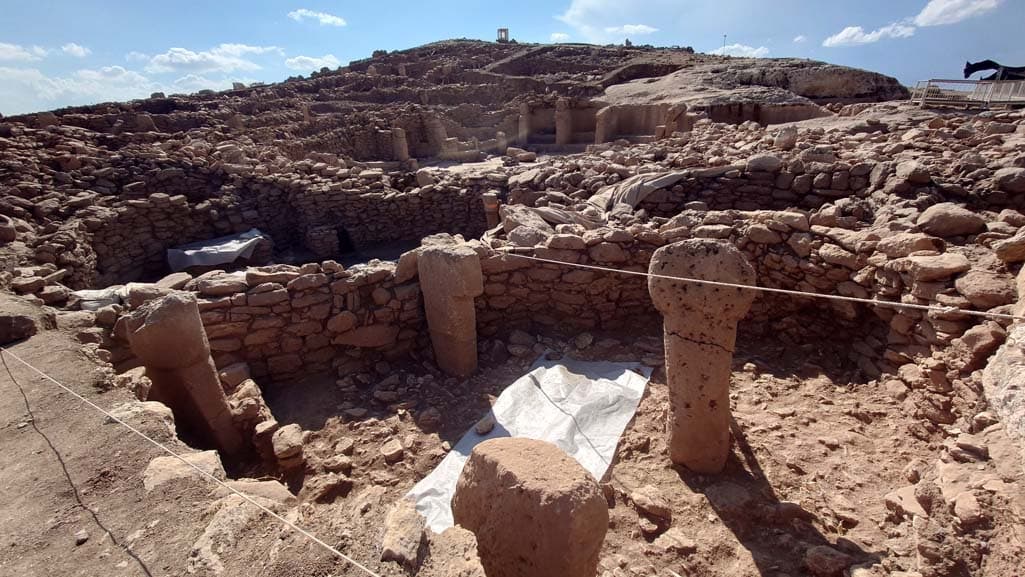Carved pillars inside the underground chamber at Karahantepe